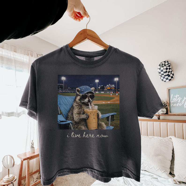 Raccoon I Live Here Now Shirt – Funny Game Day Softball & Baseball Mom Tee