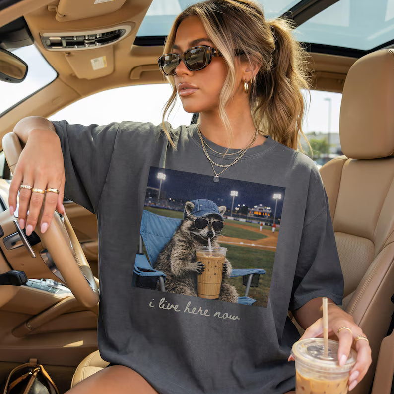 Raccoon I Live Here Now Shirt – Funny Game Day Softball & Baseball Mom Tee