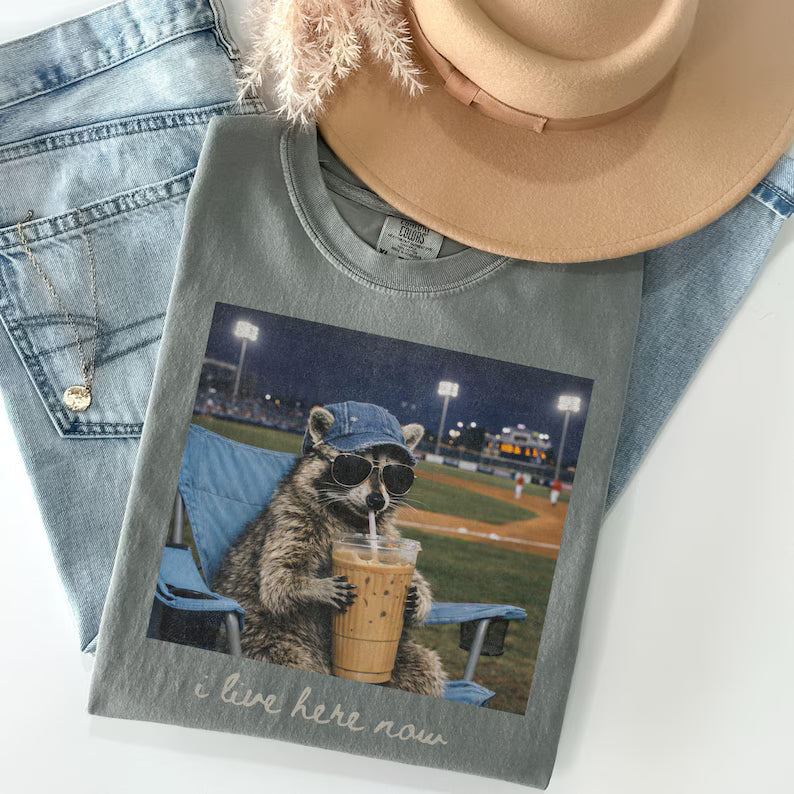 Raccoon I Live Here Now Shirt – Funny Game Day Softball & Baseball Mom Tee