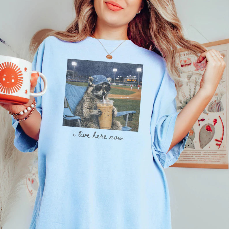 Raccoon I Live Here Now Shirt – Funny Game Day Softball & Baseball Mom Tee